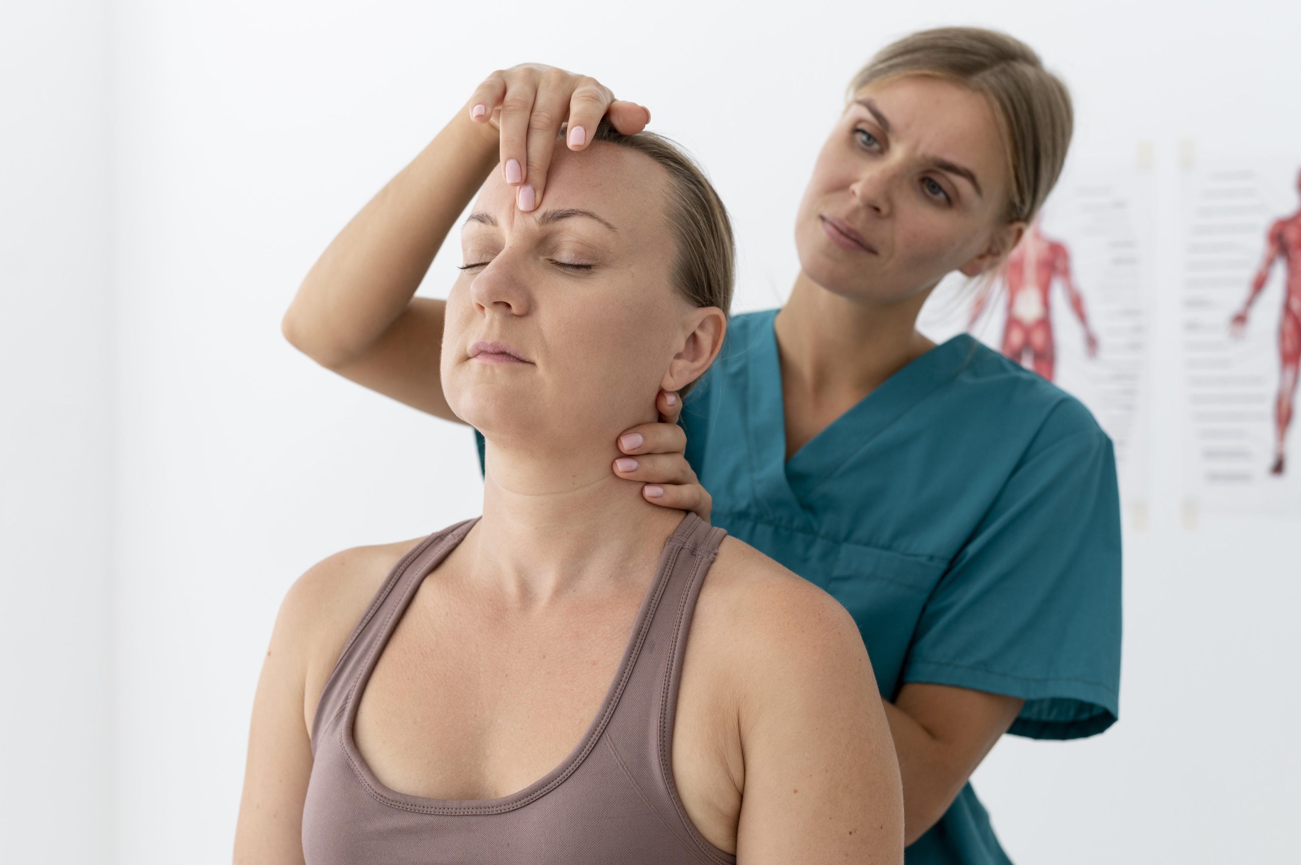 physiotherapist-helping-patient-her-clinic